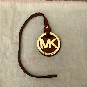 Michael Kors logo gold tone and leather